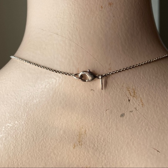 SAQ stamped women silver tone infinity twist circle pendant necklace. Used. - Picture 4 of 6